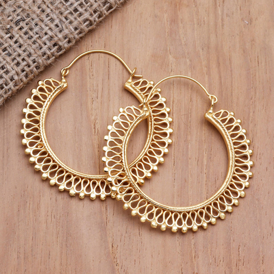 Gold-plated hoop earrings, 'Golden Infinity' - Balinese Gold-Plated Brass Heart-Themed Hoop Earrings