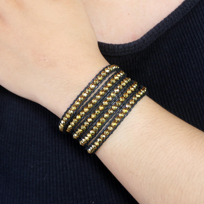 Hematite wrap bracelet, 'Golden City' - Artisan Crafted Hematite Wrap Bracelet from Bali