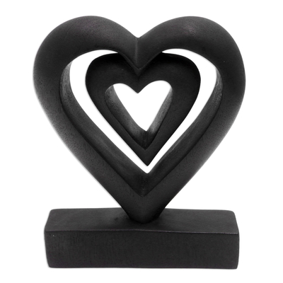Wood statuette, 'Two Loves in Black' - Hand Carved Black Suar Wood Heart Statuette