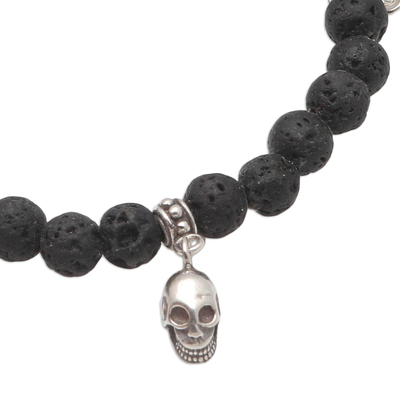 Lava stone beaded stretch bracelet, 'Lava Skulls' - Lava Stone and Sterling Silver Beaded Skull Bracelet