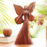 Wood statuette, 'Butterfly Queen' - Hand Carved Suar Wood Fairy Statuette