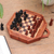 Wood chess set, 'Mind Games' - Artisan Crafted Crocodile Wood Chess Set thumbail