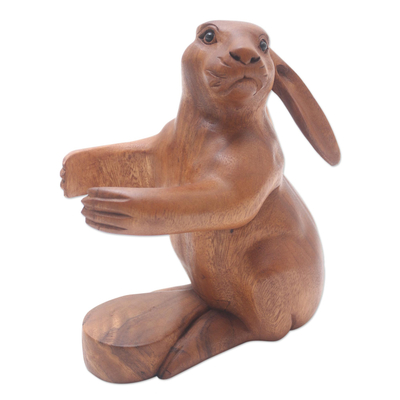 Wood wine bottle holder, 'Bunny Hug' - Hand Crafted Suar Wood Rabbit Wine Holder