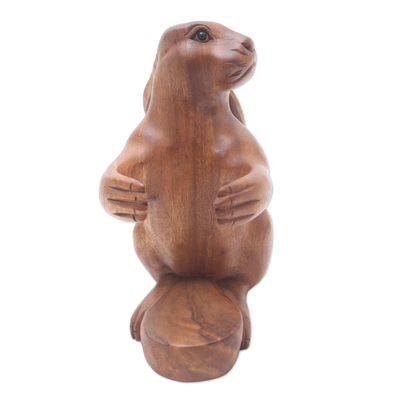 Wood wine bottle holder, 'Bunny Hug' - Hand Crafted Suar Wood Rabbit Wine Holder