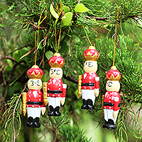 Wood holiday ornaments, 'Toy Soldiers' (set of 4) - Hand Crafted Albesia Wood Holiday Ornaments (Set of 4)