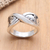 Sterling silver band ring, 'Infinity Twist' - Artisan Made Sterling Silver Band Ring (image 2b) thumbail