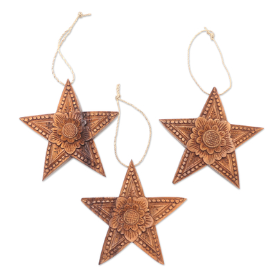 Wood ornaments, 'Sunny Christmas' (set of 3) - Hand Carved Star-Shaped Holiday Ornaments (Set of 3