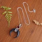 Garnet pendant necklace, 'Mysterious Crescent' - Sterling Silver and Garnet Pendant Necklace