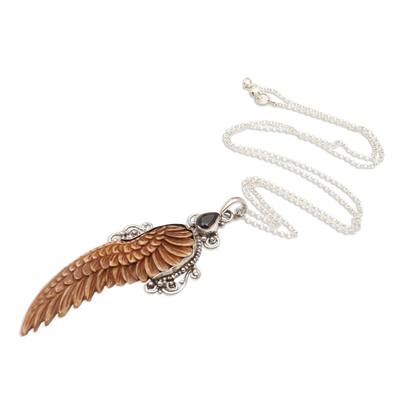 Garnet pendant necklace, 'Angelic Song' - Bone and Garnet Angel Wing Pendant Necklace