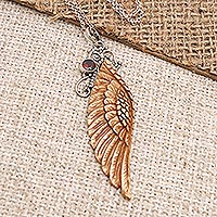 Garnet pendant necklace, 'Angelic Harmony' - Hand Crafted Bone and Garnet Pendant Necklace