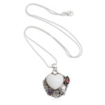 Garnet and amethyst pendant necklace, 'Garden of Love' - Amethyst and Garnet Heart-Themed Pendant Necklace