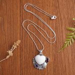 Garnet and amethyst pendant necklace, 'Garden of Love' - Amethyst and Garnet Heart-Themed Pendant Necklace