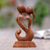 Wood statuette, 'Kisses for You in Brown' - Hand Carved Romantic Suar Wood Statuette