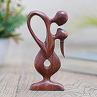 Wood statuette, 'Downpour' - Hand Made Suar Wood Figure Sculpture