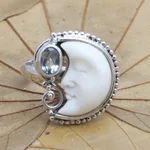 Blue topaz cocktail ring, 'Sleeping Moon' - Blue Topaz and Sterling Silver Crescent Moon Ring