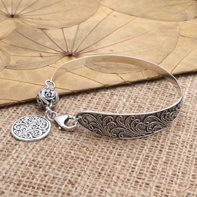 Handcrafted Sterling Silver Cuff Bracelet - Attraction | NOVICA