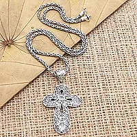 Blue topaz pendant necklace, 'Magic Cross' - Blue Topaz Cross-Motif Pendant Necklace