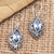Blue topaz dangle earrings, 'Air Battle' - Blue Topaz and Sterling Silver Dangle Earrings (image 2) thumbail