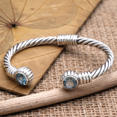 Blue topaz cuff bracelet, 'Holding On' - Hand Crafted Blue Topaz Cuff Bracelet