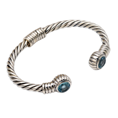 Blue topaz cuff bracelet, 'Holding On' - Hand Crafted Blue Topaz Cuff Bracelet