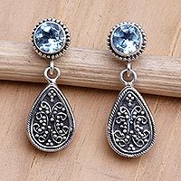 Blue topaz dangle earrings, 'Mystic Leaves in Blue' - Sterling Silver and Blue Topaz Dangle Earrings from Bali