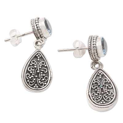 Blue topaz dangle earrings, 'Mystic Leaves in Blue' - Sterling Silver and Blue Topaz Dangle Earrings from Bali
