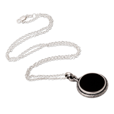 Onyx pendant necklace, 'Circle Shadow' - Handcrafted Sterling Silver and Onyx Pendant Necklace