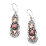 Gold-accented garnet earrings, 'Red Cocoon' - Gold-Accented Sterling Silver and Garnet Dangle Earrings