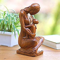 Wood sculpture, 'A Mother's Care' - Suar Wood Family-Themed Sculpture