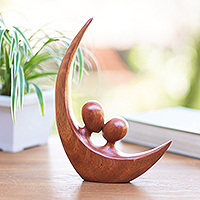 Featured review for Wood statuette, Crescent Pair