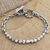 Men's sterling silver pendant bracelet, 'Party Animal' - Men's Balinese Sterling Silver Pendant Bracelet