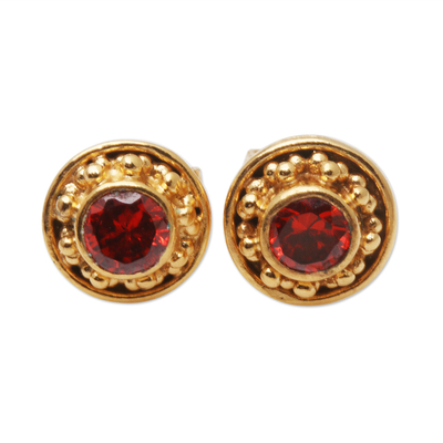 Gold-plated garnet stud earrings, 'Balinese Offering' - Gold-Plated Garnet Stud Earrings from Bali