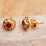Gold-plated garnet stud earrings, 'Balinese Offering' - Gold-Plated Garnet Stud Earrings from Bali