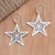 Sterling silver dangle earrings, 'Superstar Glow' - Sterling Silver Star-Motif Dangle Earrings thumbail