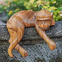 Wood statuette, 'Wild Nap' - Artisan Crafted Suar Wood Monkey Statuette