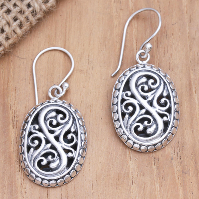 Sterling silver dangle earrings, 'Perfect Strangers' - Hand Crafted Sterling Silver Dangle Earrings