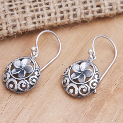 Sterling silver dangle earrings, 'Gianyar's Beauty' - Frangipani-Themed Sterling Silver Dangle Earrings from Bali