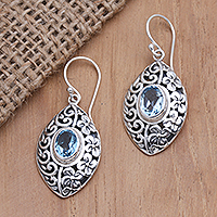 Blue topaz dangle earrings, 'Frangipani Glory' - Blue Topaz Sterling Silver Dangle Earrings from Bali