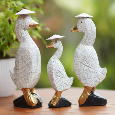 Albesia wood sculptures, 'Hatted Ducks' (set of 3) - Handmade Albesia Wood Duck Statuettes (Set of 3)