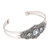 Blue topaz cuff bracelet, 'Sacred Crown' - Blue Topaz and Sterling Silver Cuff Bracelet