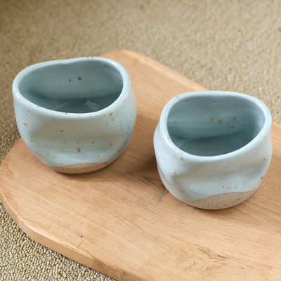 Ceramic teacups, 'Blue Squeeze' (pair) - Handmade Ceramic Teacups from Java (Pair)
