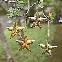 Wood holiday ornaments, 'Seeing Stars' (set of 4) - Hand Carved Star-Motif Holiday Ornaments (Set of 4)