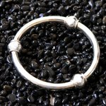 Sterling silver bangle bracelet, 'Suggestive Trio' - Sterling Silver Bangle Bracelet