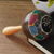 Maraca de cáscara de coco - Sonajero maraca de cáscara de coco con diseño de sol multicolor