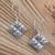 Sterling silver dangle earrings, 'Meet and Greet' - Hand Crafted Sterling Silver Dangle Earrings