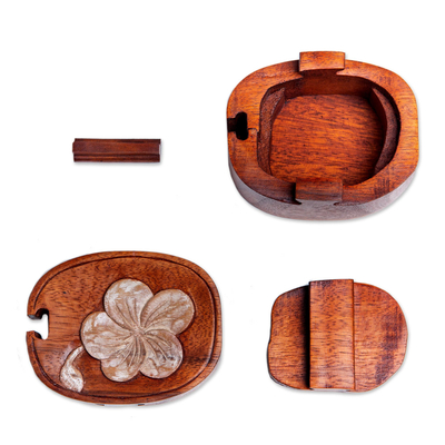 Wood puzzle box, 'Soft Frangipani' - Hand-Painted Suar Wood Puzzle Box