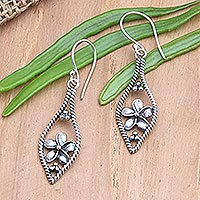Sterling silver dangle earrings, 'Frangipani Twist' - Balinese Sterling Silver Frangipani Dangle Earrings