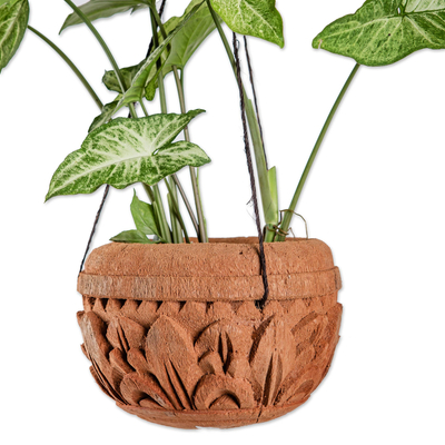 Coconut shell hanging planter, 'Floating Florals' - Handcrafted Coconut Shell Planter from Bali