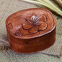 Decorative wood puzzle box, 'Frangipani Puzzle' - Suar Wood Puzzle Box with Frangipani Motif