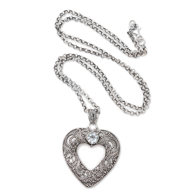 Blue topaz pendant necklace, 'Lucky Me' - Blue Topaz Pendant Necklace with Heart Motif